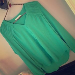 Green v-neck blouse