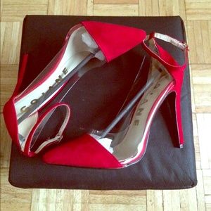 red pointy toe shoes.