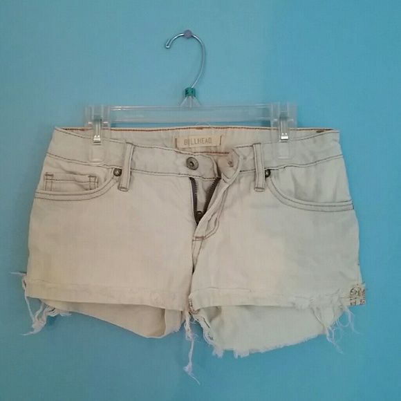 Distressed white shorts
