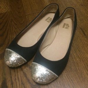 Black and gold flats