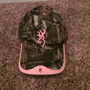 Pink and camouflage hat