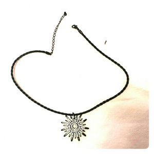 Black sunburst necklace