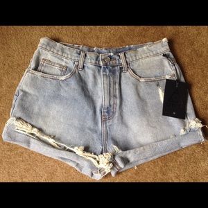 UNIF distressed high waisted cutoff shorts. Sz 29