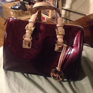 Purple monogram Michael Kors handbag