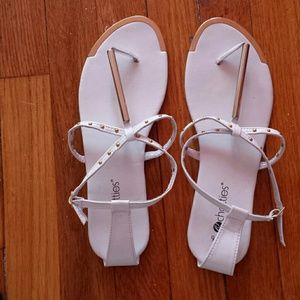 White and gold sandals