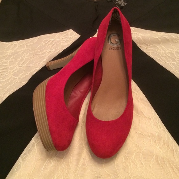 Red suede pumps