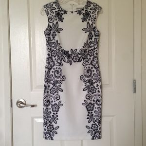 White dress with blue floral border, size 6p