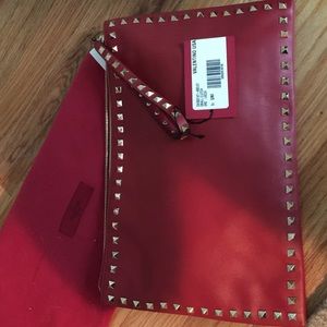 SOLD Brand new Valentino "red" rockstuds large clu