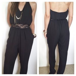 🚨SOLD🚨Black open back jumpsuit with lace.NWOT