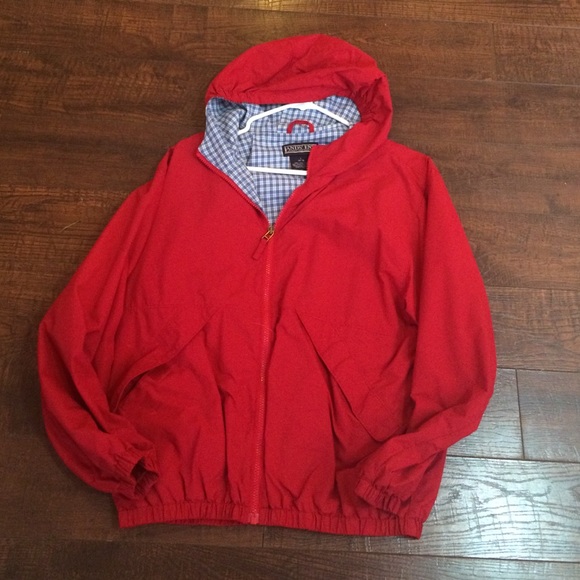 Red windbreaker.