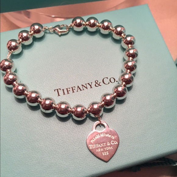 Return to Tiffany small heart bracelet w/receipt!