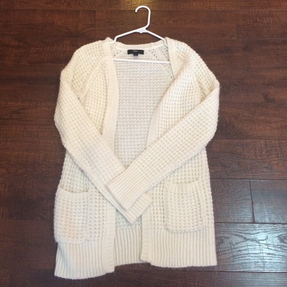 Long white sweater.