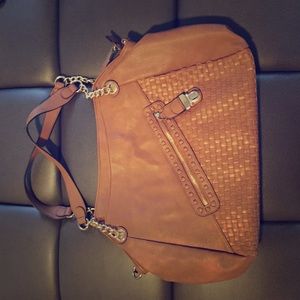 Tan purse with gold embellishments