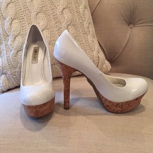Jennifer Lopez white patent pumps