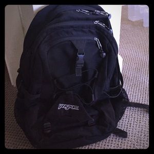 Black Jansport Backpack.