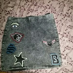 Dark acid wash jean skirt.