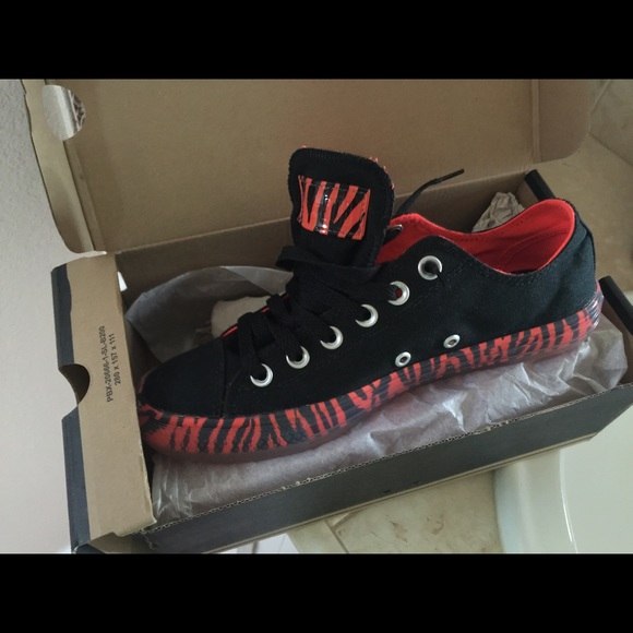 Black and orange converse