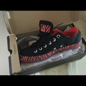 Black and orange converse