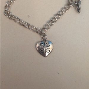 Retired silver big sis charm