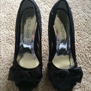 Black and gold open toe heels