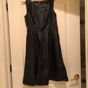 Black leather like dress with lace back