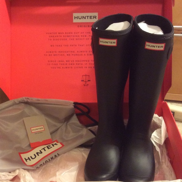Brand new Hunter boots with original packaging.