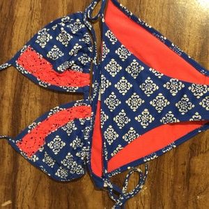 A blue and white fashioned bathing suit