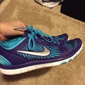 Purple and blue nikes