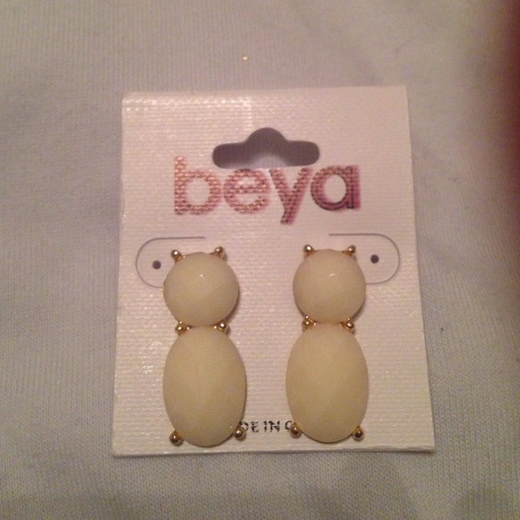 Cream statement earrings