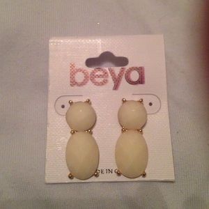 Cream statement earrings