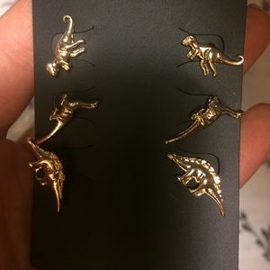 gold dino earrings!