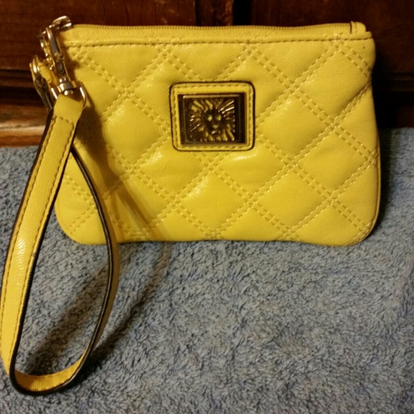 Bright yellow Anne Klein wristlet