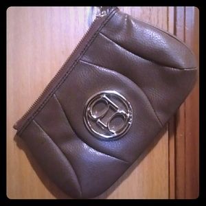Bebe clutch purse Bebe logo on front