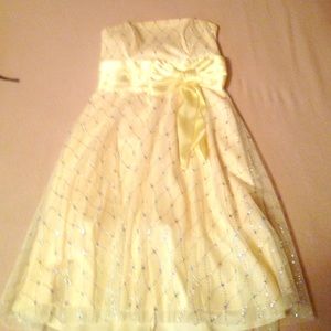 Short yellow sparkly prom dress by B. Darlin.
