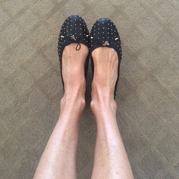 Sam Edelman black flat shoes with gold dots.