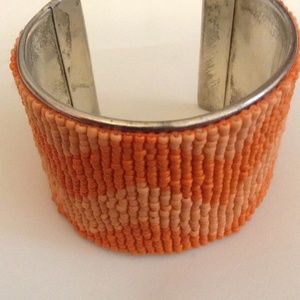 Handmade orange chevron beaded cuff