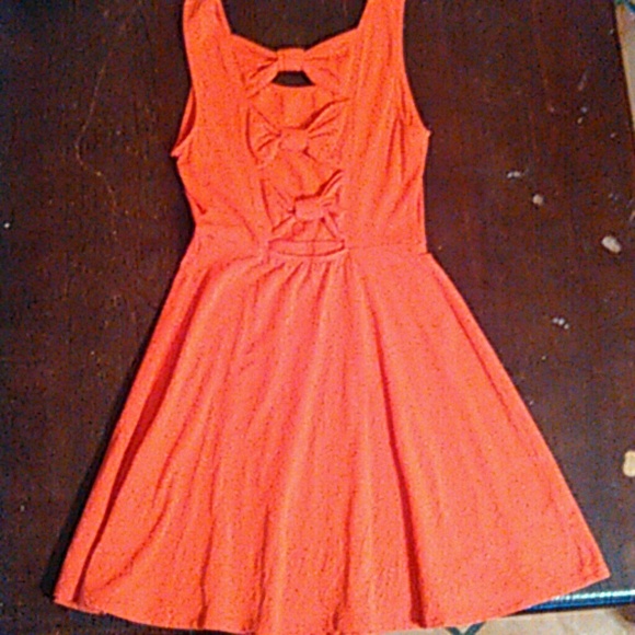 Cute dark coral dress with bows