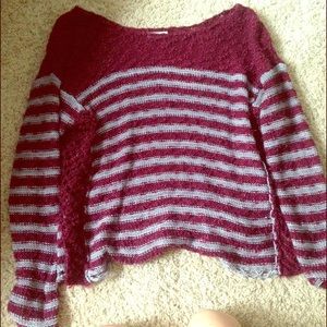 red and grey sweater