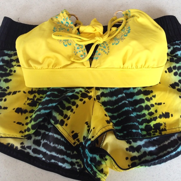Bright yellow bikini top and pool shorts 🌞