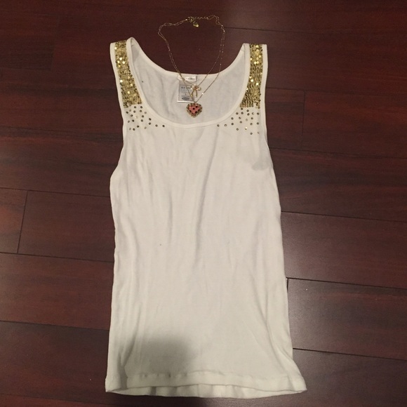 Gold glitter tank top.