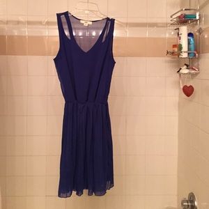 Blue dress with sheer back and pleated skirt