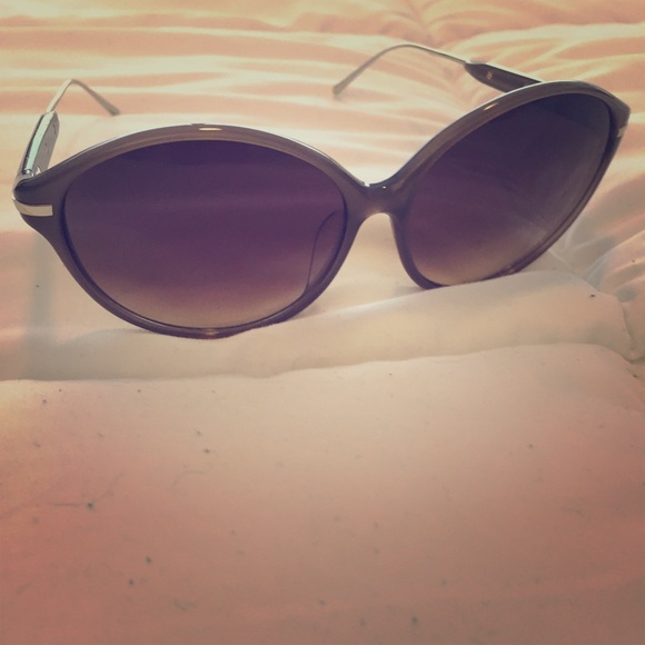 Linda Farrow sunglasses.