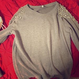 Grey sweater with beaded shoulders