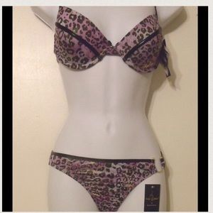 Purple metallic bikini by Baby Phat.