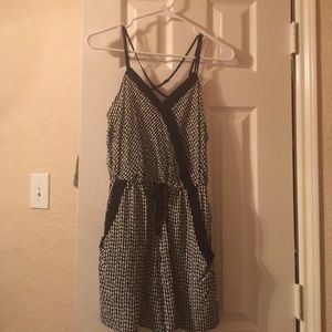 Cute black/white romper. NWOT. Never Worn.