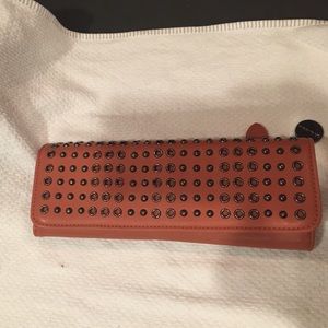 Big Buddha clutch wallet. Light coral color