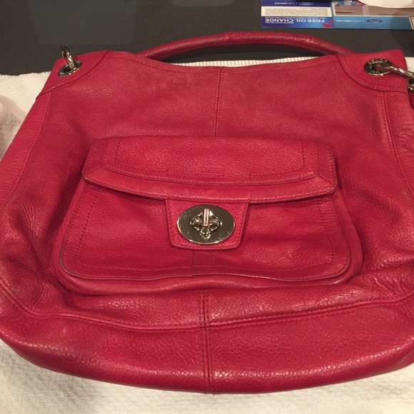 Dark pink, almost red Coach purse