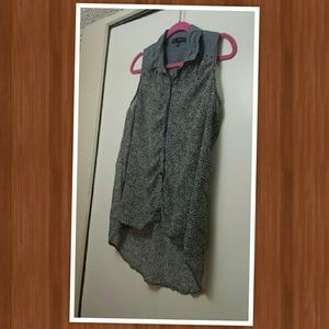 High low sleeveless button up shirt