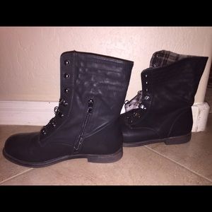 Black boots with plaid inside