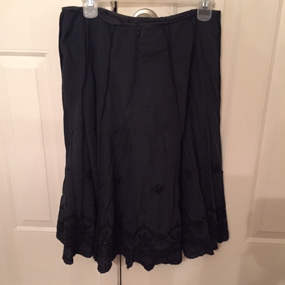 Knee length, black flared skirt